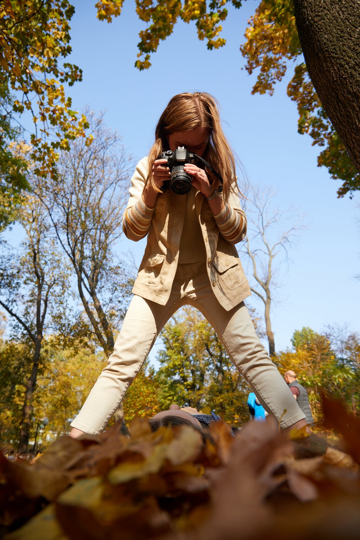 A student shooting upward with her camera